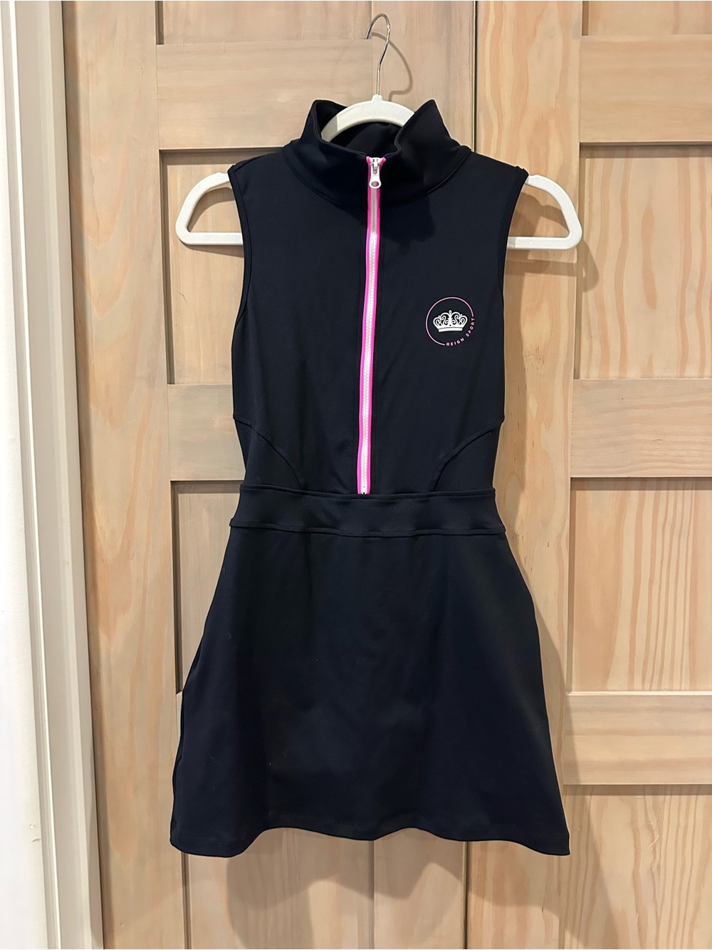 Sleeveless Black Active Dress with Pink Zipper and crown accents
